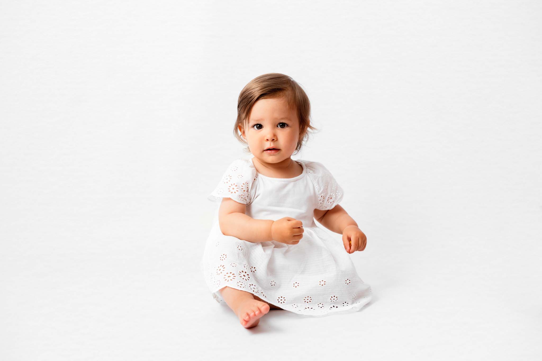 Babyfoto Baby Mädchen in Weiß